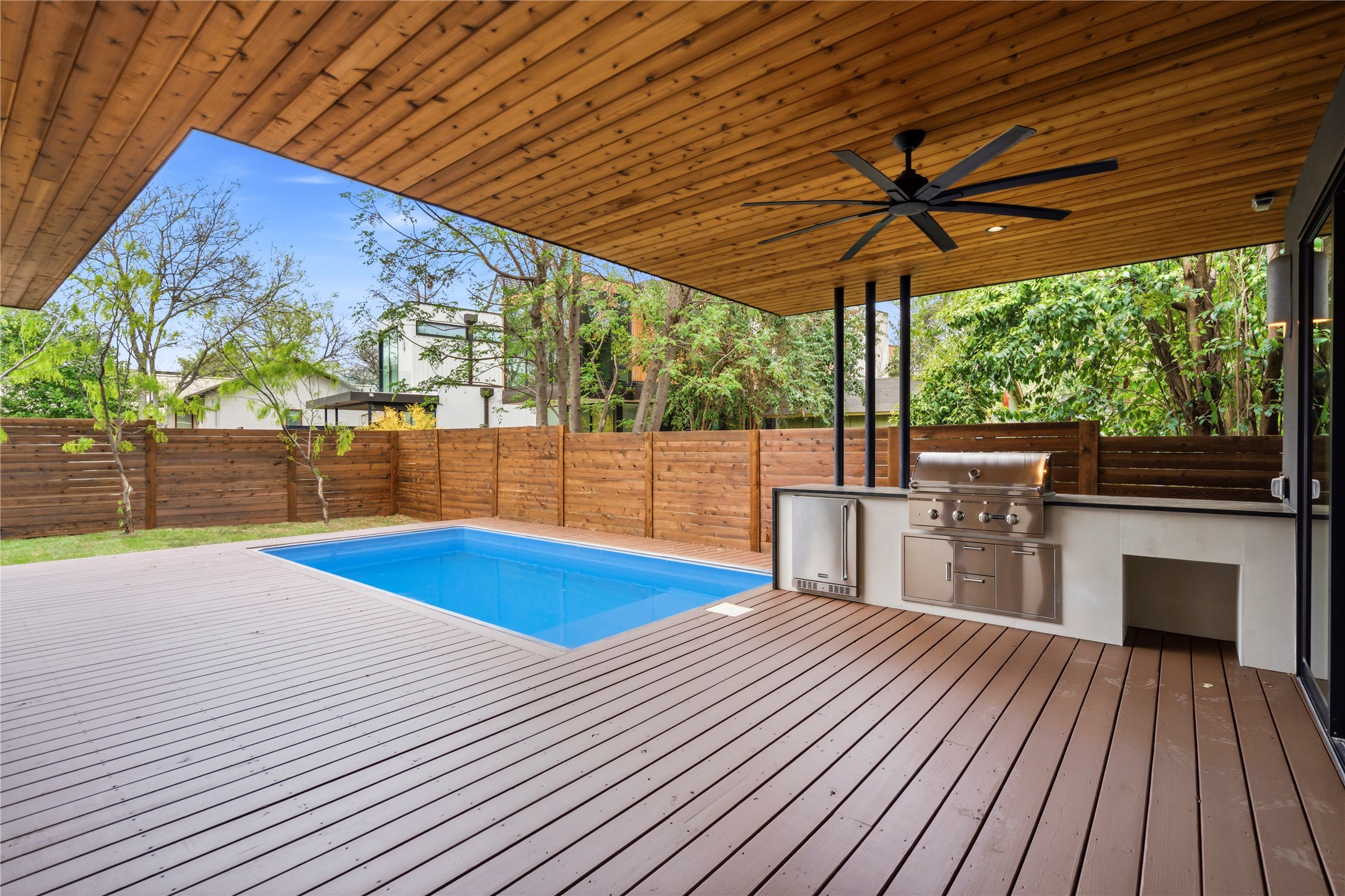2306 South 2nd Street Austin, TX 78704 - Photo 31 of 36 Fully fenced backyard and outdoor kitchen