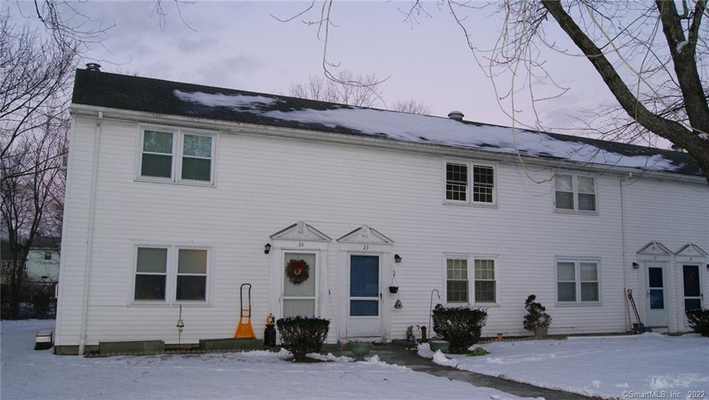 27 Georgia Road, Unit 24 Montville, CT 06370 - Photo 1 of 1 a front view of a house with a yard