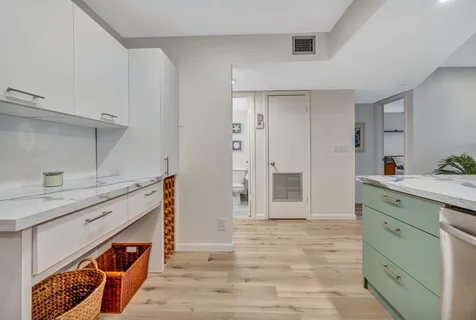 a room with mirror and window