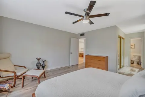 a bedroom with a bed and furniture