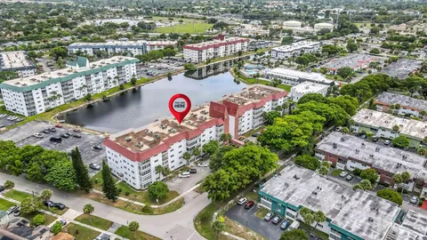 an aerial view of a city with lots of residential buildings