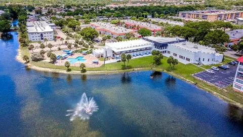 an aerial view of a house with outdoor space