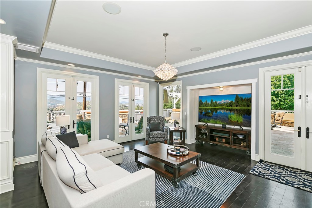 3124 Pachappa Drive Riverside, CA 92506 - Photo 16 of 50 a living room with furniture floor to ceiling window and wooden floor