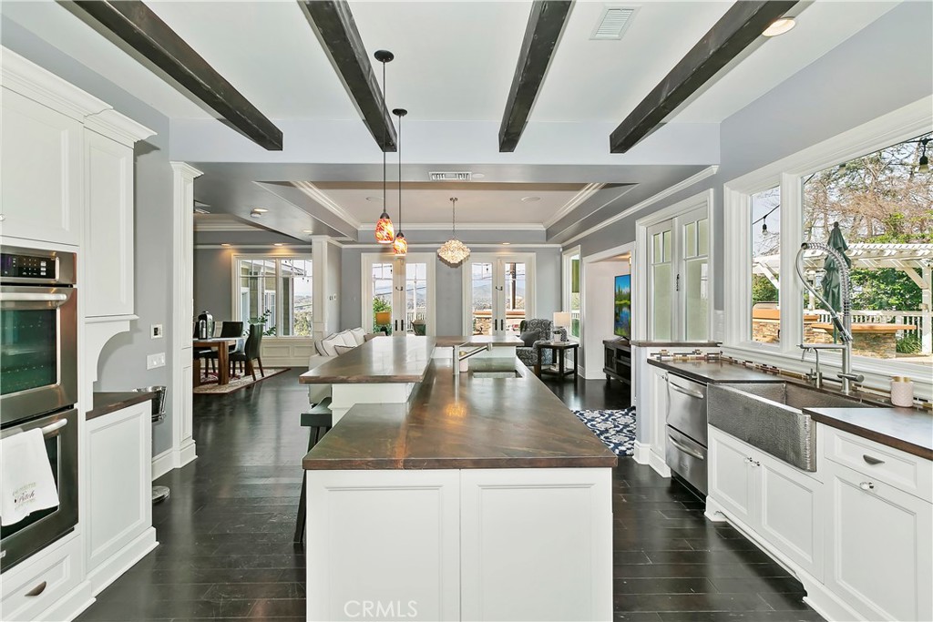 3124 Pachappa Drive Riverside, CA 92506 - Photo 19 of 50 a large white kitchen with lots of counter top space