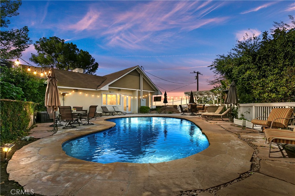 3124 Pachappa Drive Riverside, CA 92506 - Photo 2 of 50 a view of a house with swimming pool