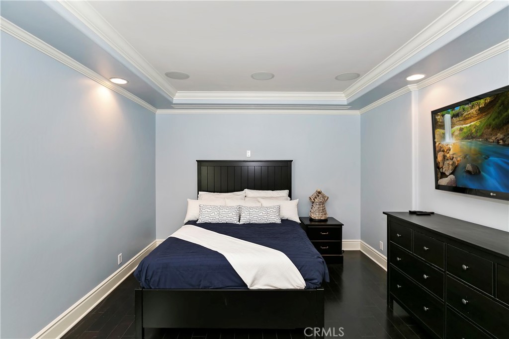 3124 Pachappa Drive Riverside, CA 92506 - Photo 26 of 50 a bedroom with a bed and a flat screen tv