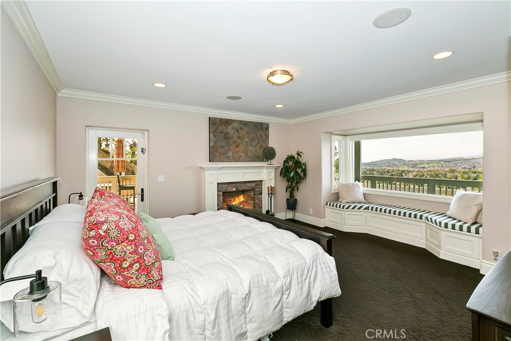 3124 Pachappa Drive Riverside, CA 92506 - Photo 27 of 50 a bed sitting in a spacious bedroom next to a window