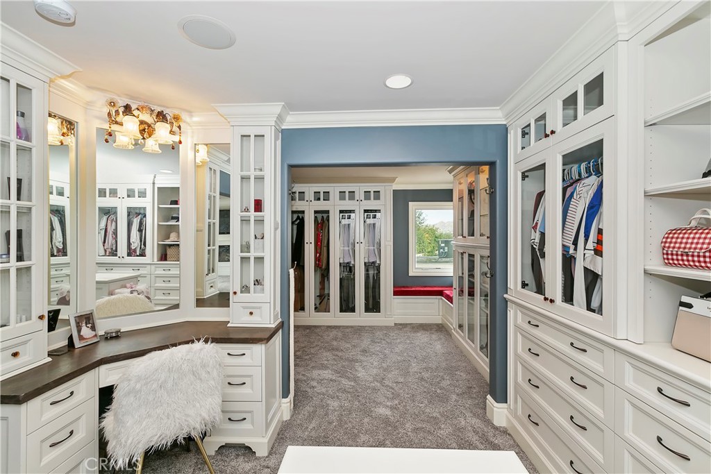 3124 Pachappa Drive Riverside, CA 92506 - Photo 38 of 50 a living room with furniture a flat screen tv and a sink