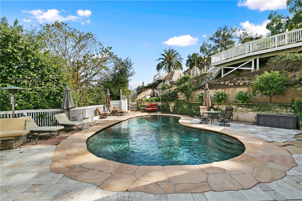 3124 Pachappa Drive Riverside, CA 92506 - Photo 39 of 50 a view of a swimming pool with a sitting space