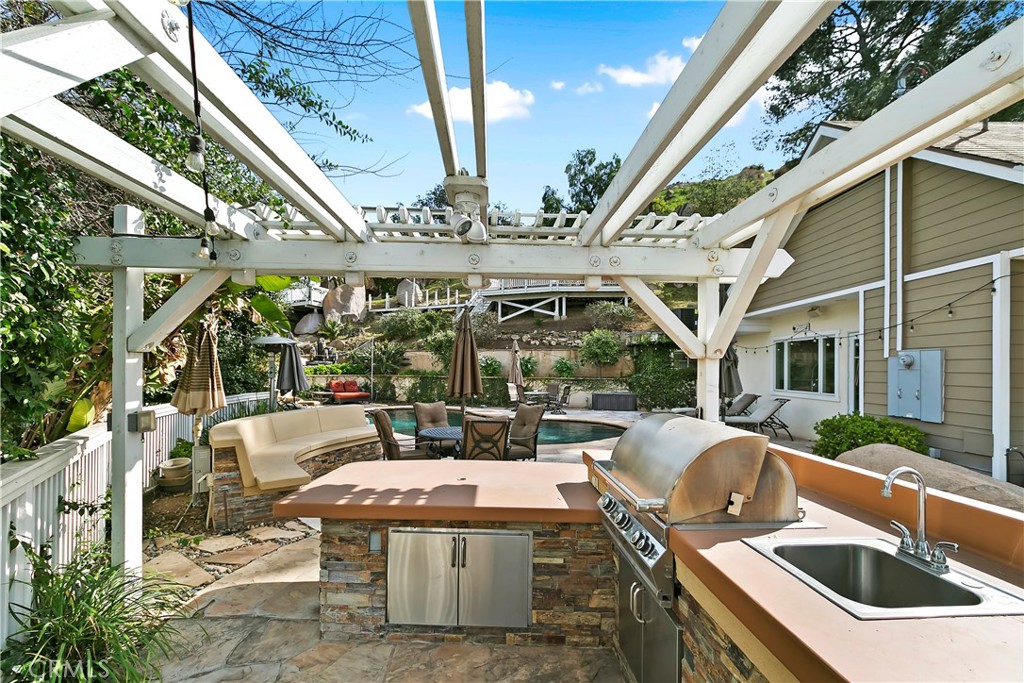 3124 Pachappa Drive Riverside, CA 92506 - Photo 40 of 50 a view of a patio with couches table and chairs