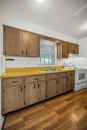 a large kitchen with cabinets