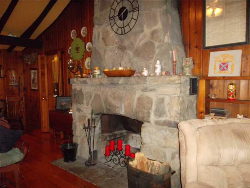 115 Broadview Road New Stanton, PA 15672 - Photo 4 of 14 Living Room. wood burning fp