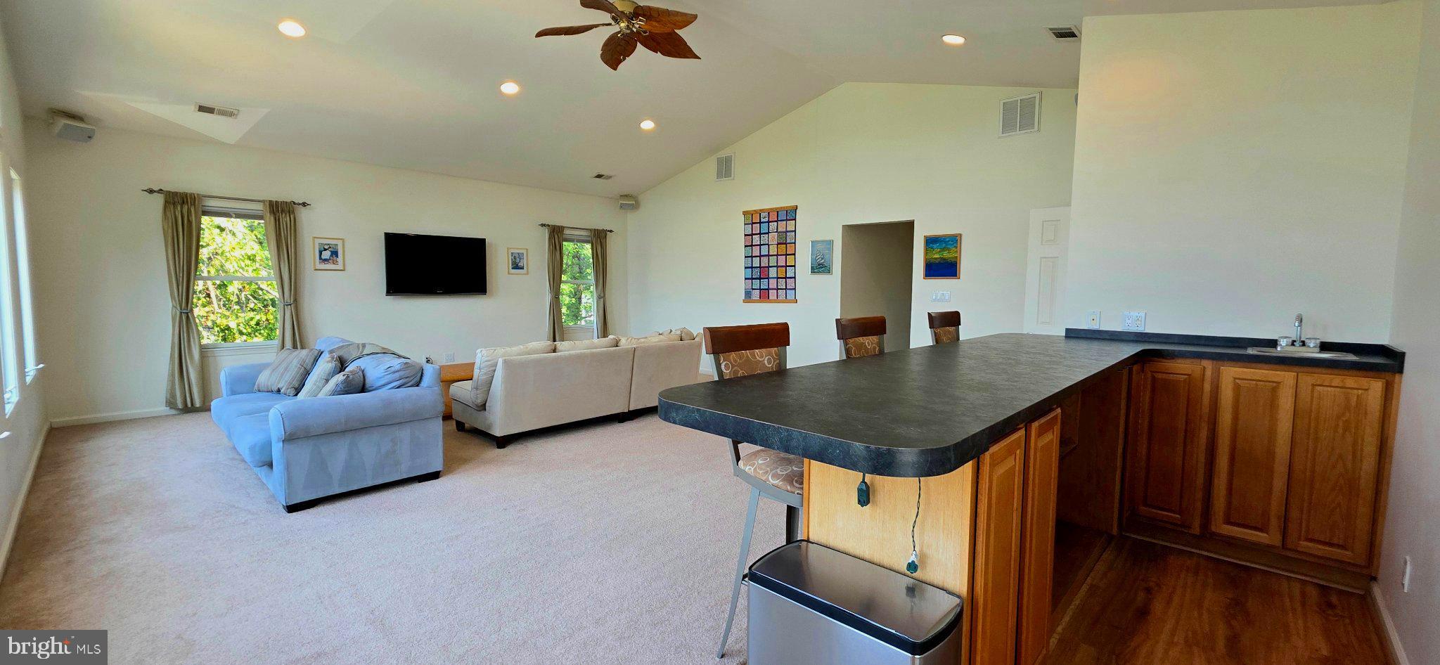 8418 Geneva Road Pasadena, MD 21122 - Photo 4 of 53 Spacious living area with natural light.