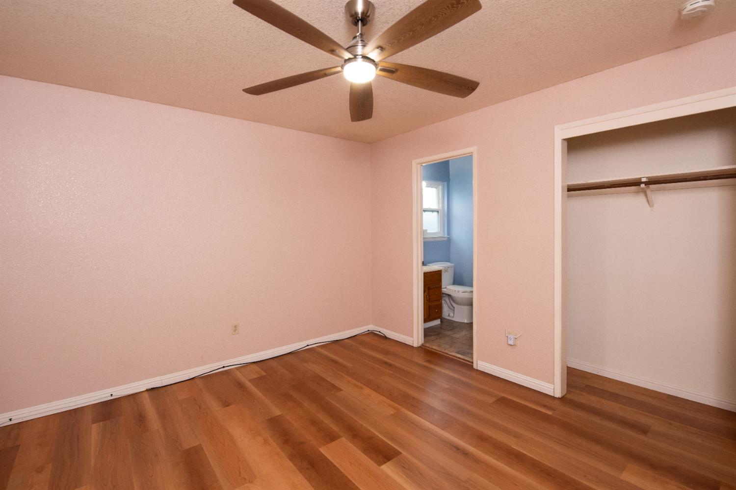 404 Trask Lane Modesto, CA 95354 - Photo 11 of 25 wooden floor in an empty room