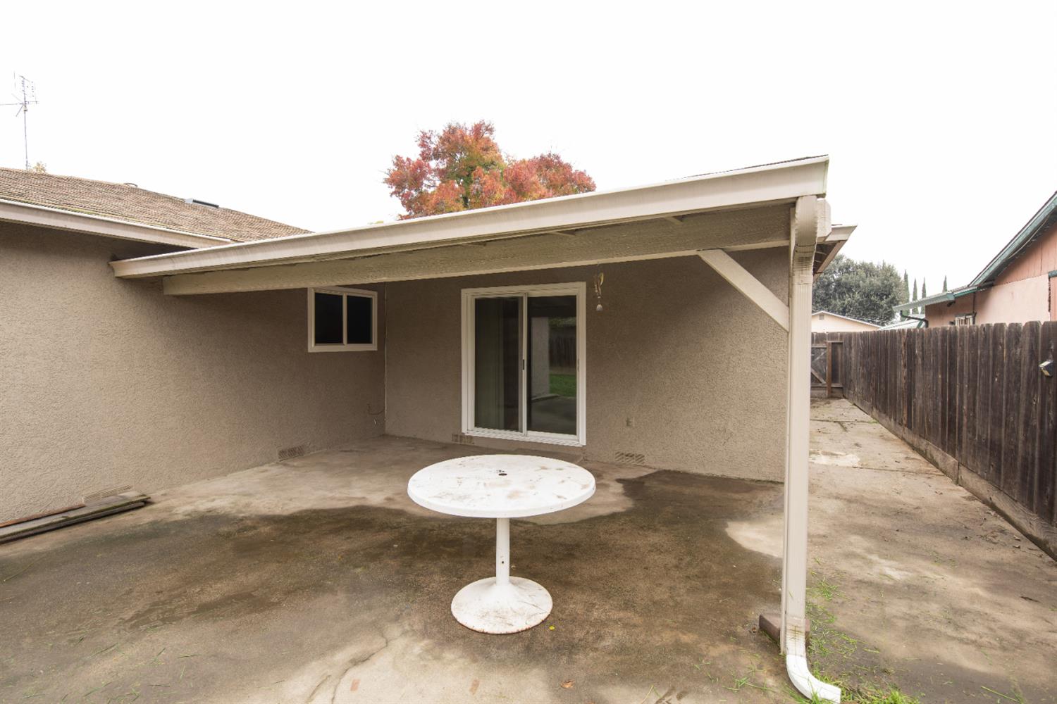 404 Trask Lane Modesto, CA 95354 - Photo 23 of 25 a backyard of a house with table and chairs