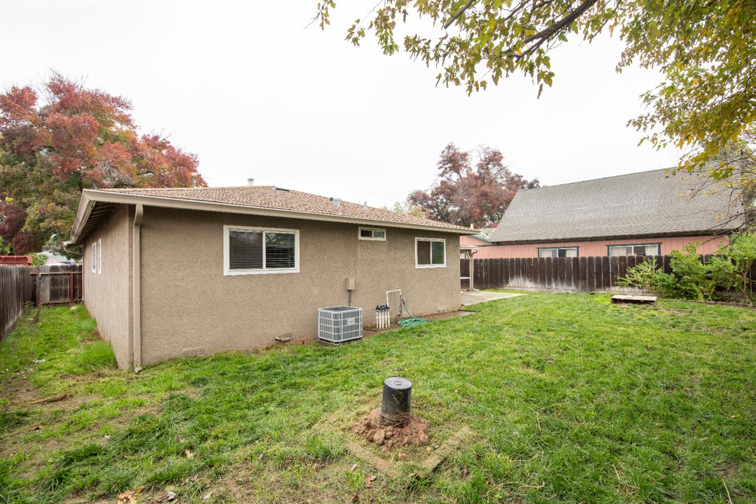 404 Trask Lane Modesto, CA 95354 - Photo 25 of 25 a view of a house with yard and a garden