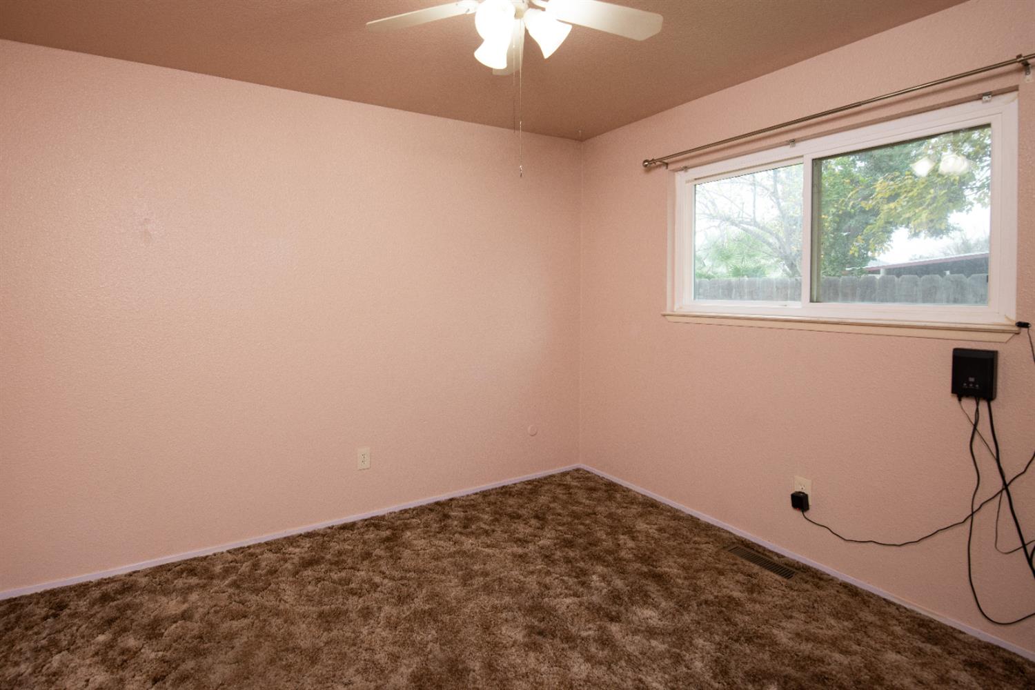 404 Trask Lane Modesto, CA 95354 - Photo 9 of 25 a view of a room with a window
