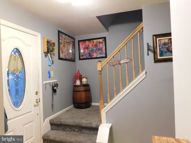 a view of entryway with furniture and entryway