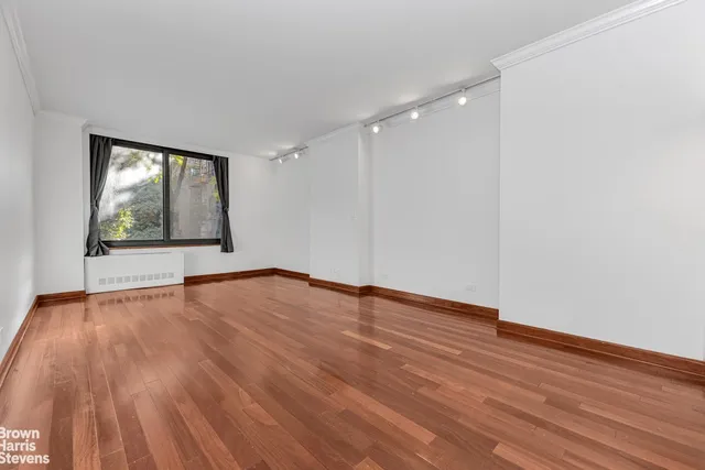 a sign board with parking area