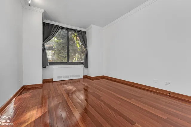 a kitchen with granite countertop a sink and a stove top oven