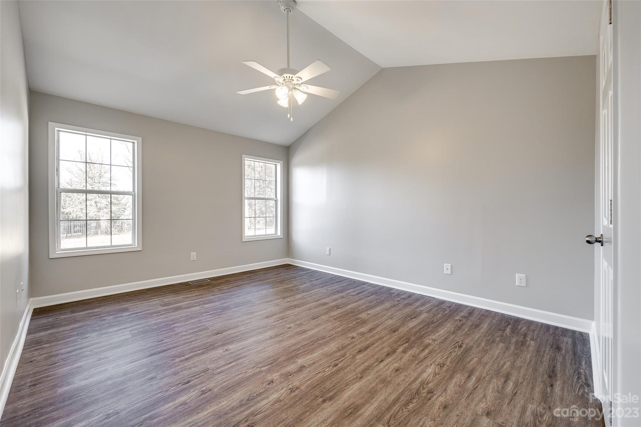 149 Airport Road Monroe, NC 28110 - Photo 18 of 41 a view of an empty room with wooden floor and a window