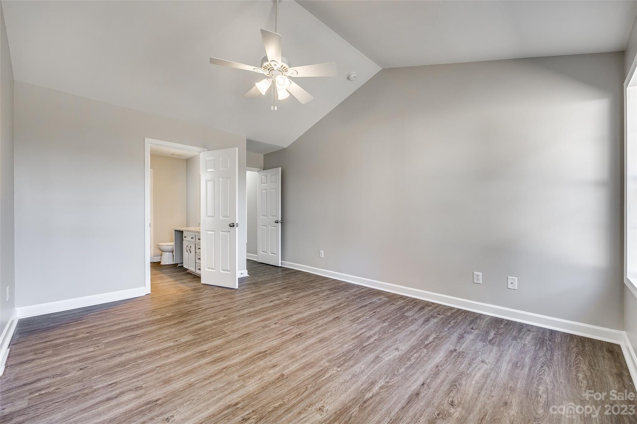 149 Airport Road Monroe, NC 28110 - Photo 19 of 41 a view of an empty room with wooden floor