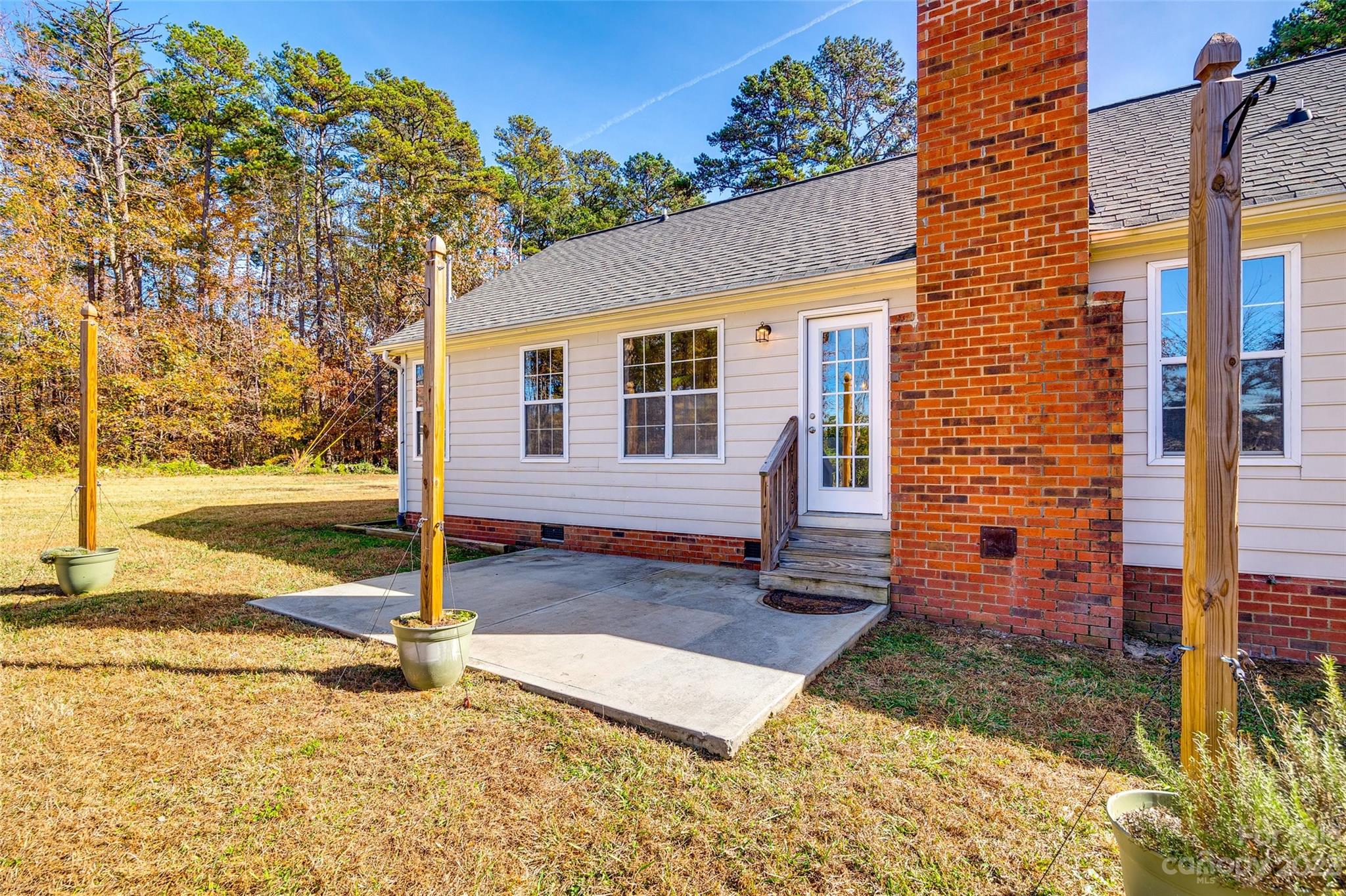 149 Airport Road Monroe, NC 28110 - Photo 30 of 41 a view of a house with backyard