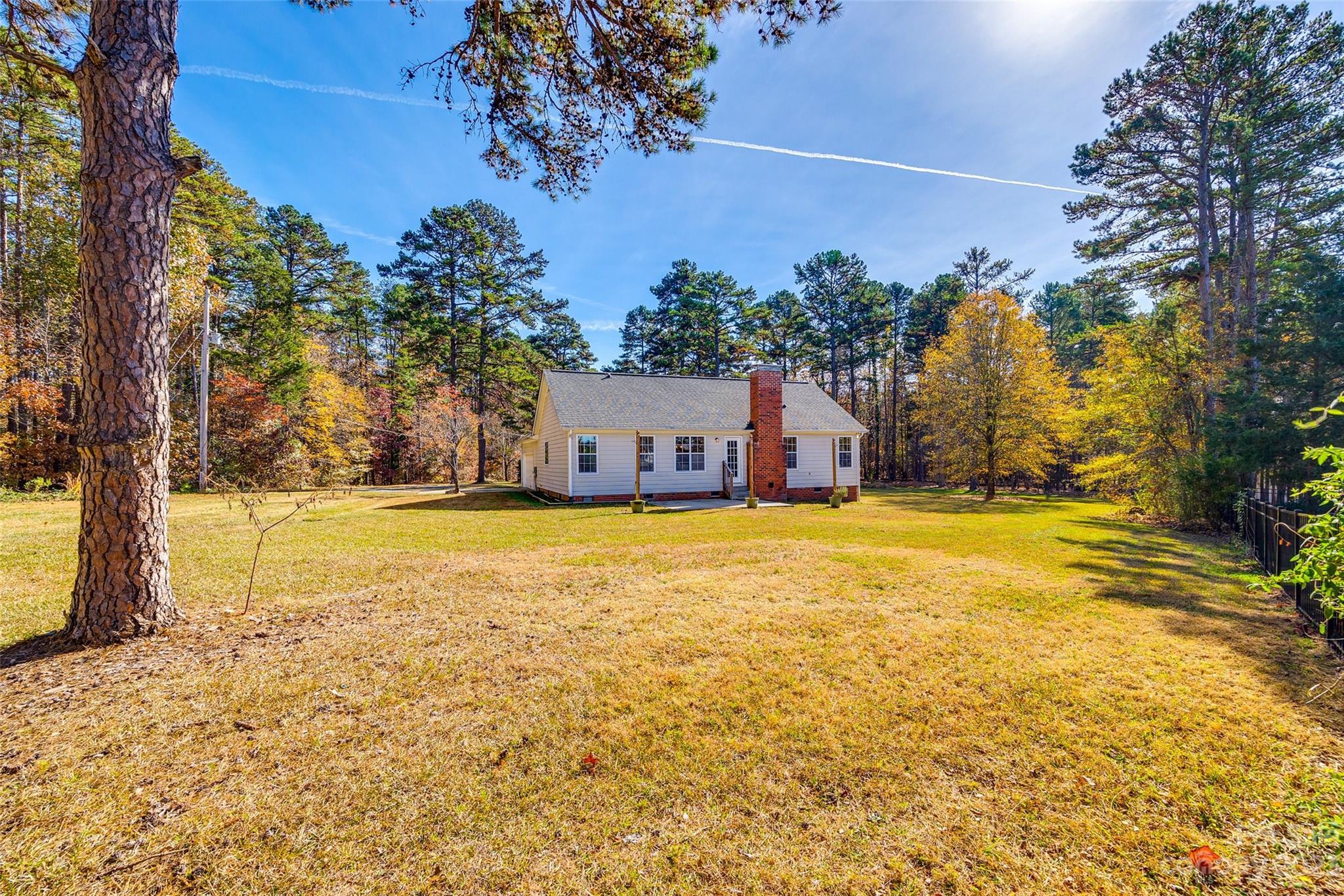 149 Airport Road Monroe, NC 28110 - Photo 32 of 41 a view of swimming pool with an outdoor space