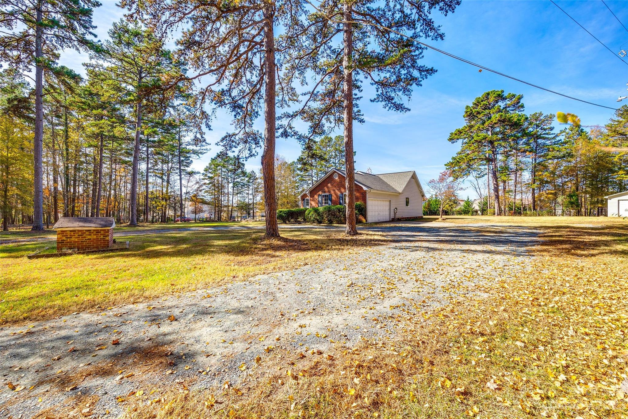 149 Airport Road Monroe, NC 28110 - Photo 34 of 41 a view of road with large trees