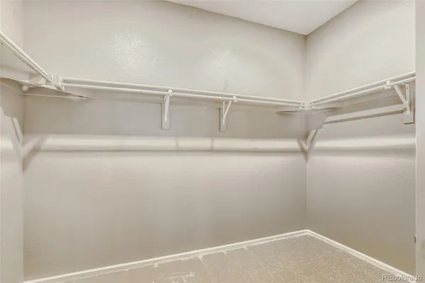a view of an empty walk in closet