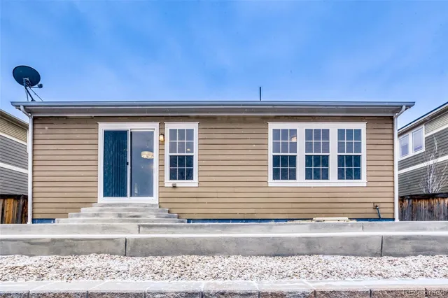 a black and white photo of a house