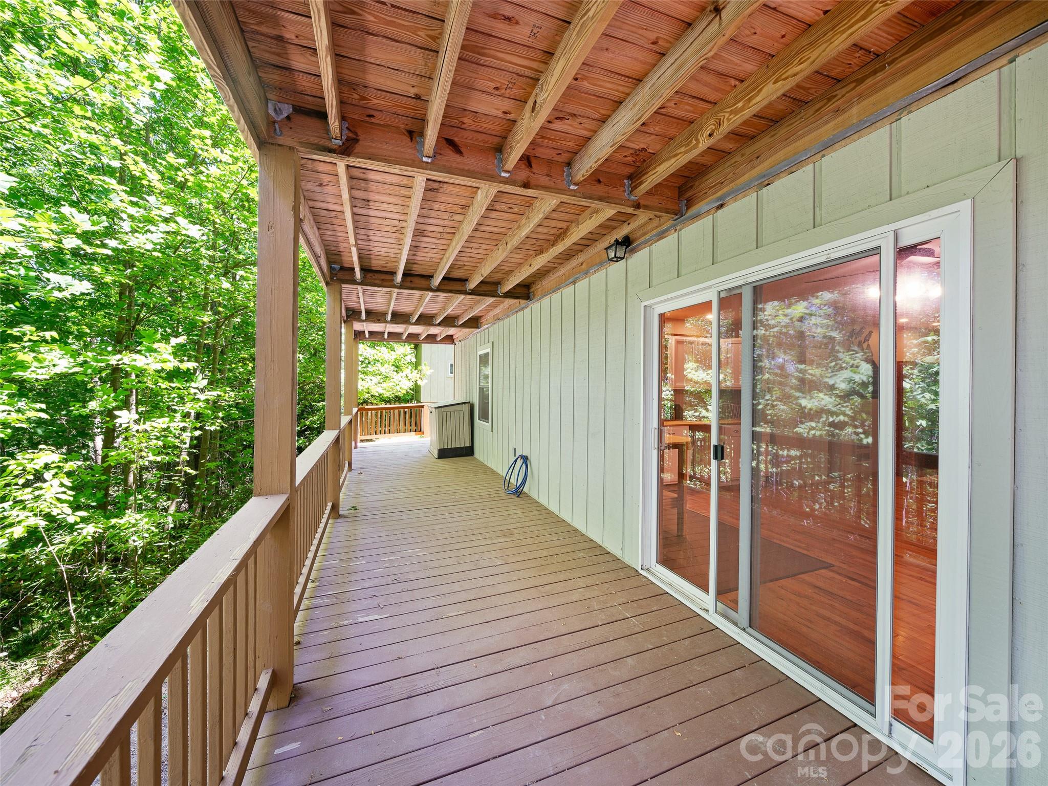 142 Wildflower Road Spruce Pine, NC 28777 - Photo 28 of 46 a view of balcony with wooden floor