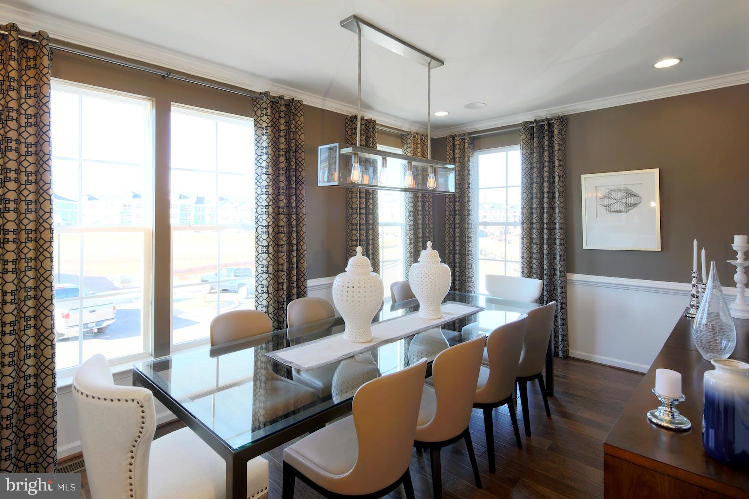 9057 Connor House Road Manassas, VA 20111 - Photo 5 of 10 a dining room with furniture and wooden floor