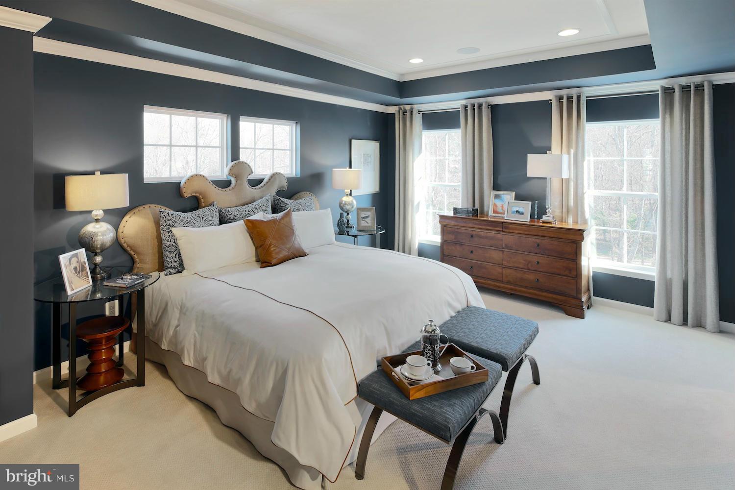 9057 Connor House Road Manassas, VA 20111 - Photo 6 of 10 a bedroom with a bed and wooden floor