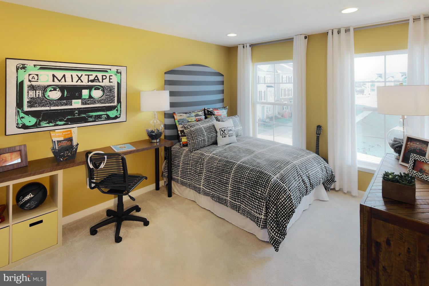 9057 Connor House Road Manassas, VA 20111 - Photo 7 of 10 a bedroom with a bed and gym equipment