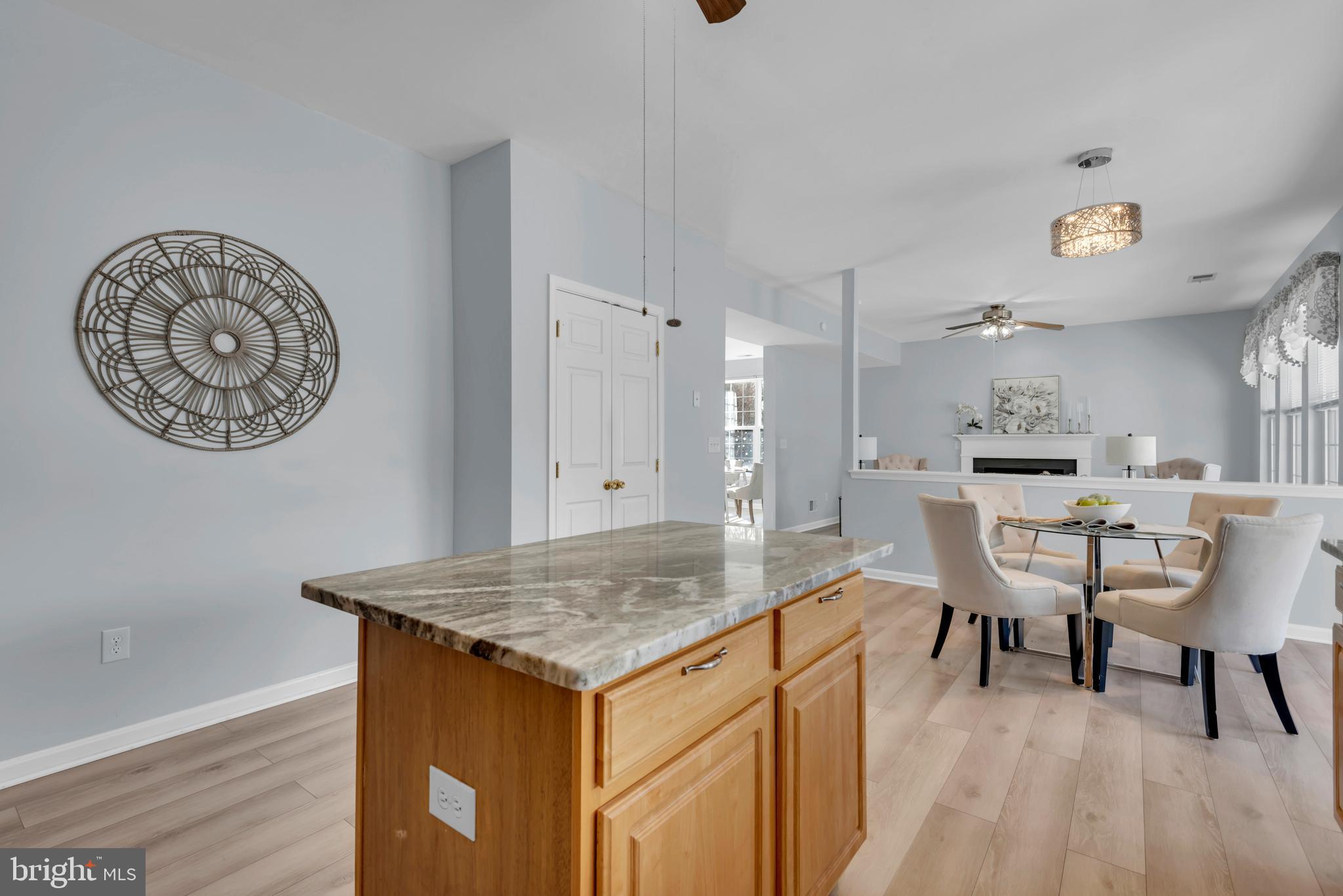 1104 Ruddy Duck Court Denton, MD 21629 - Photo 22 of 50 a view of a kitchen area with furniture and wooden floor