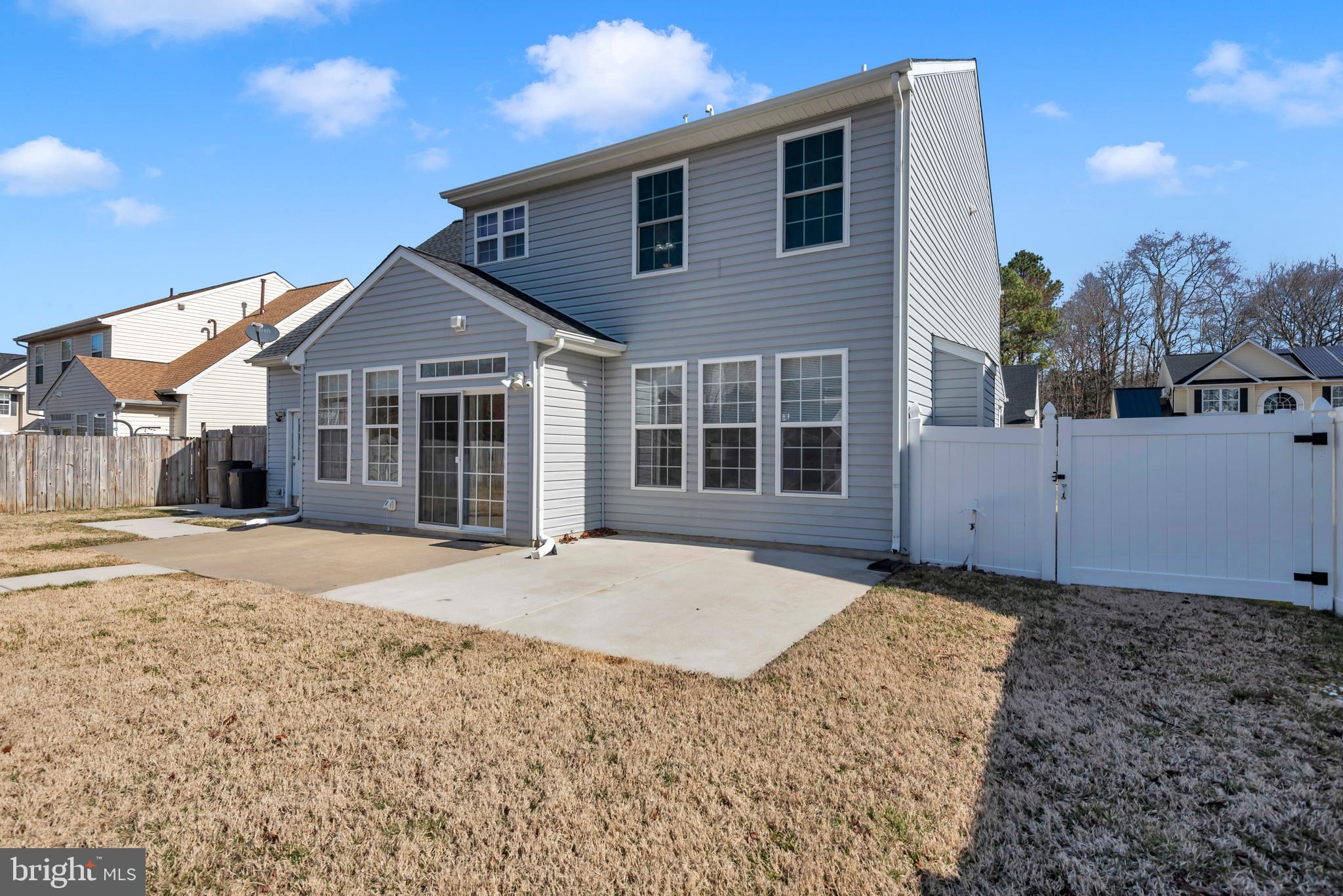 1104 Ruddy Duck Court Denton, MD 21629 - Photo 41 of 50 a front view of a house with a yard