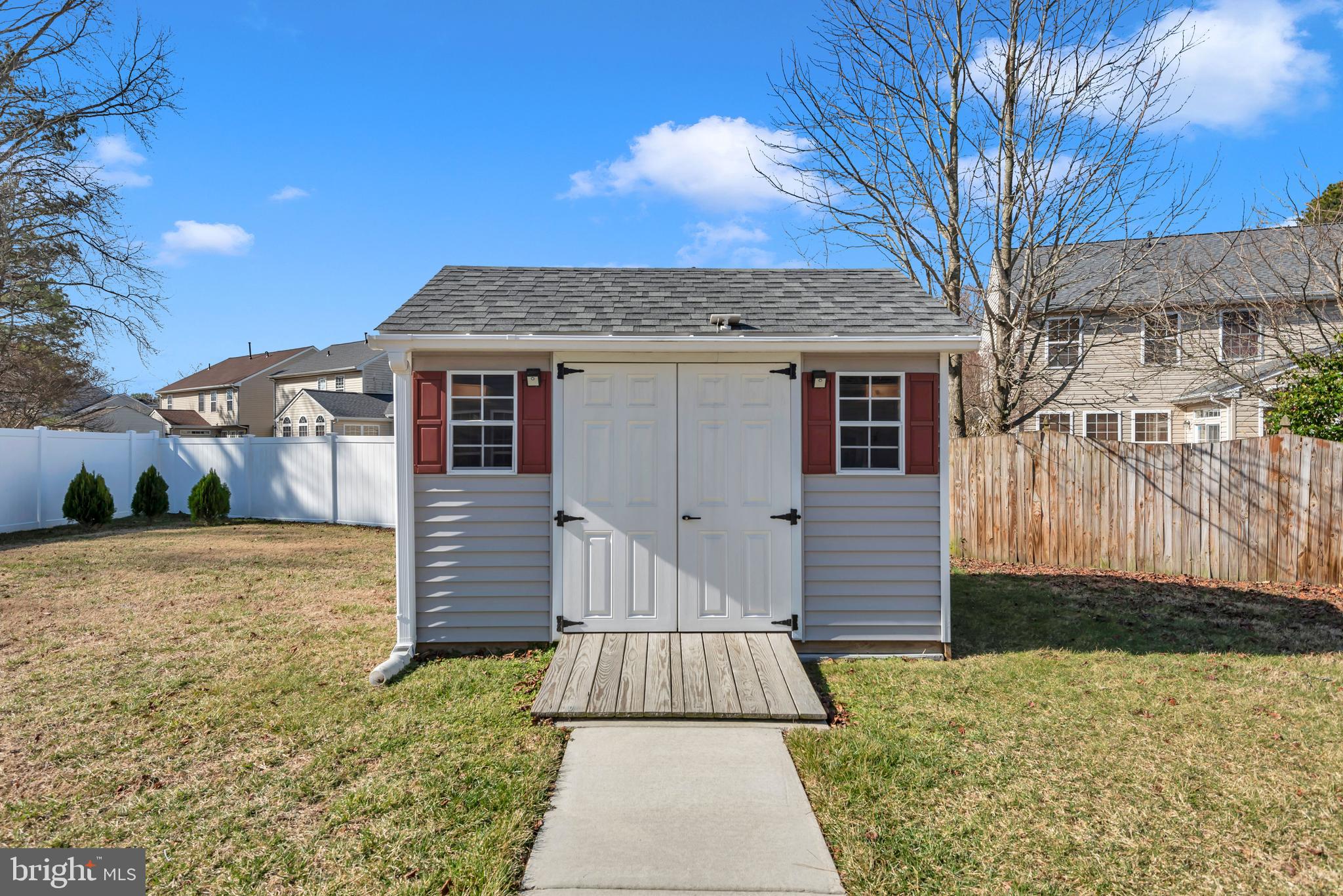 1104 Ruddy Duck Court Denton, MD 21629 - Photo 42 of 50 a front view of a house with a yard