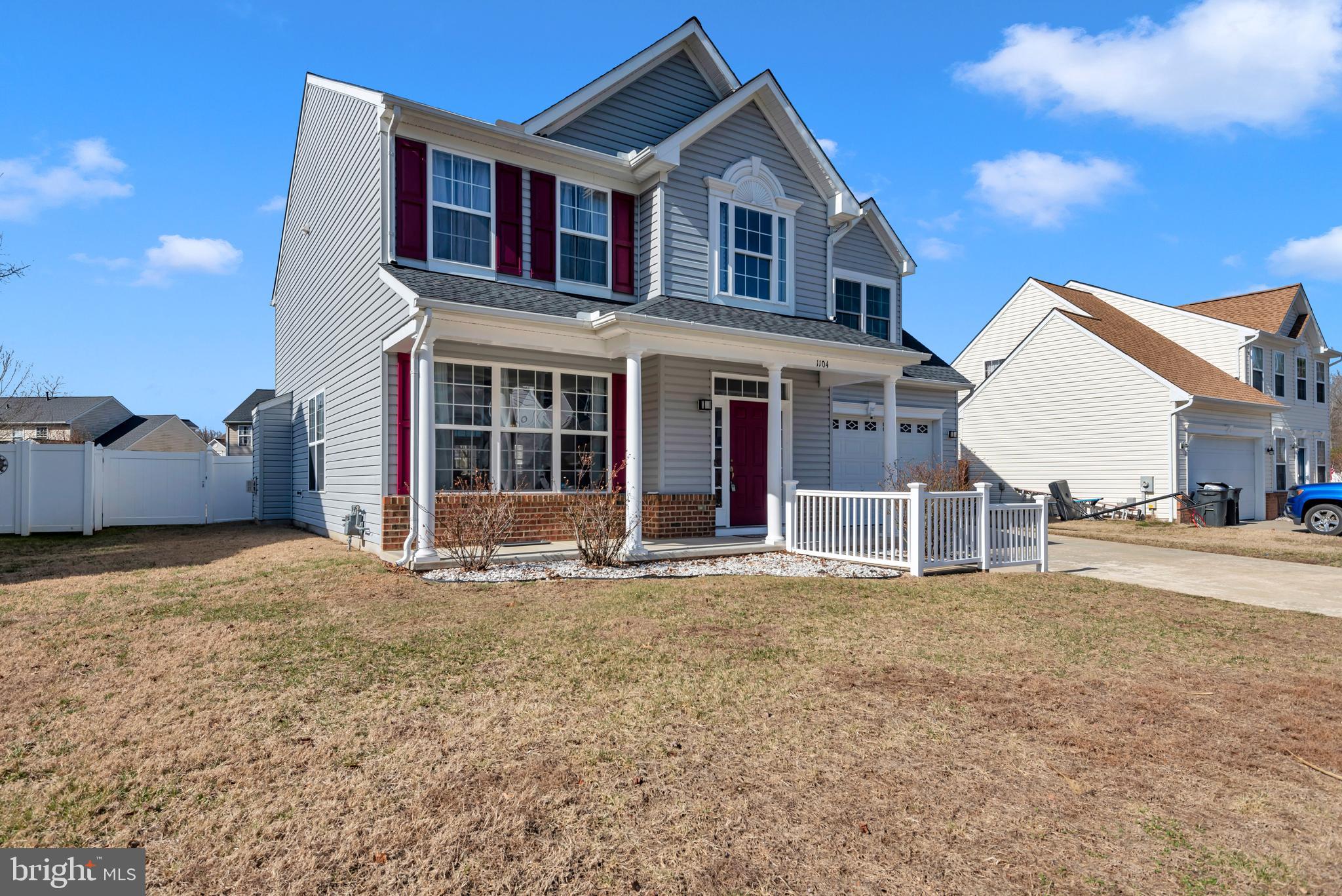 1104 Ruddy Duck Court Denton, MD 21629 - Photo 49 of 50 a front view of a house with a garden