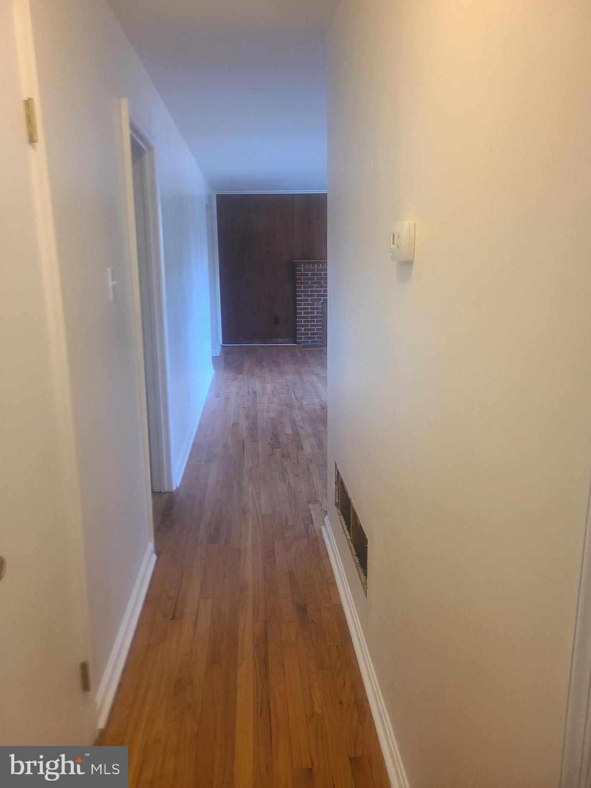 12305 Rock Point Road Newburg, MD 20664 - Photo 12 of 12 a view of a hallway with wooden floor
