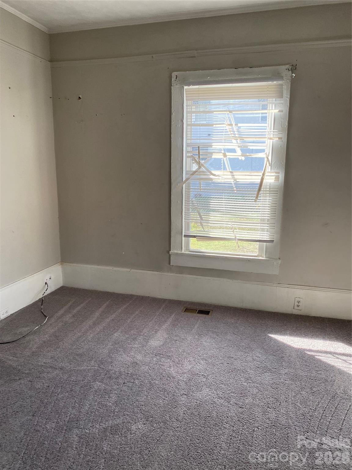 303 Rogers Lake Road Kannapolis, NC 28081 - Photo 12 of 20 an empty room with a window