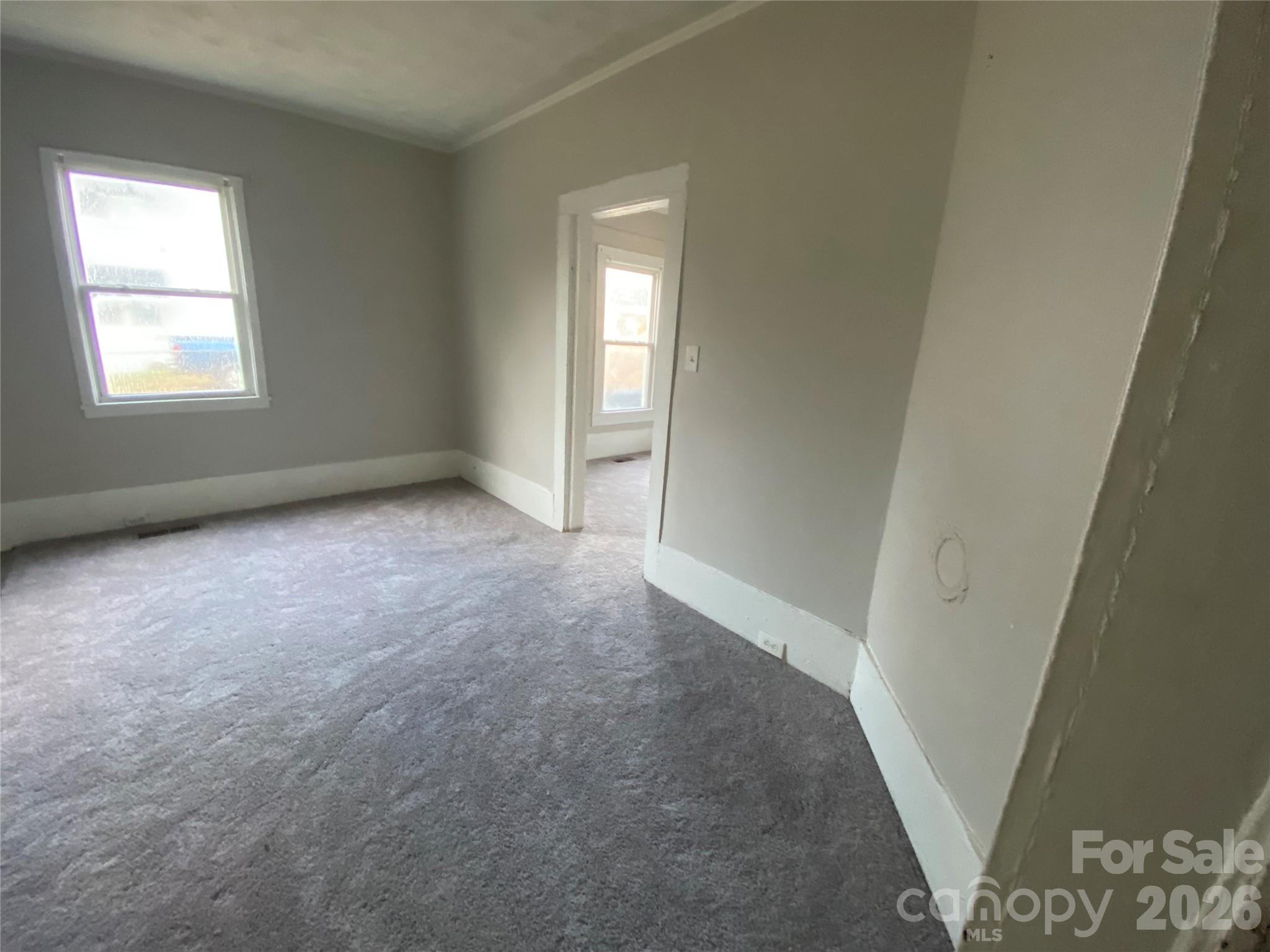 303 Rogers Lake Road Kannapolis, NC 28081 - Photo 15 of 20 an empty room with windows and closet