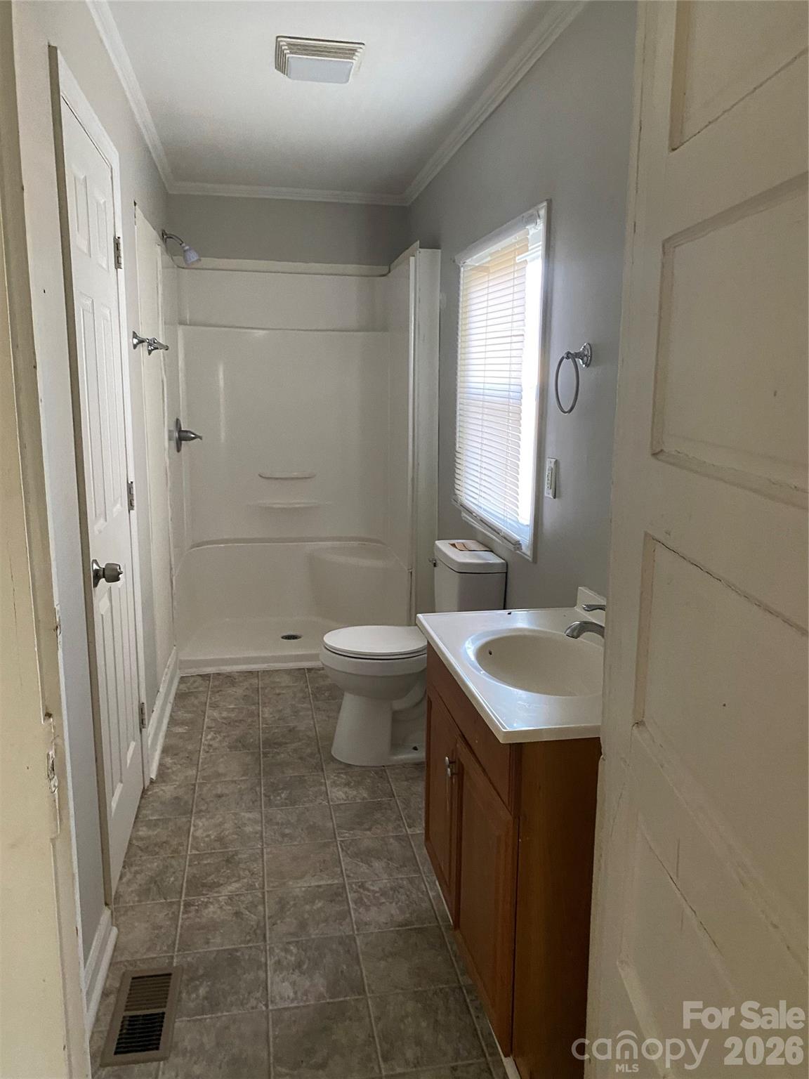 303 Rogers Lake Road Kannapolis, NC 28081 - Photo 20 of 20 a bathroom with a sink toilet and shower