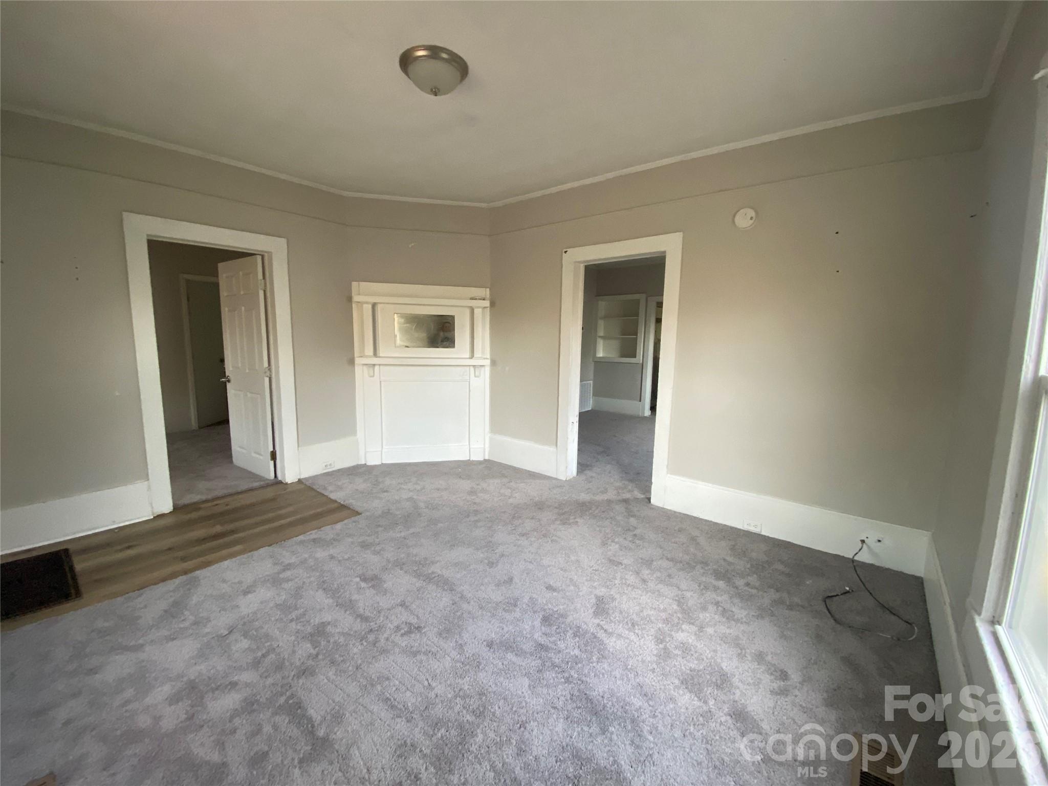 303 Rogers Lake Road Kannapolis, NC 28081 - Photo 6 of 20 an empty room with a natural light