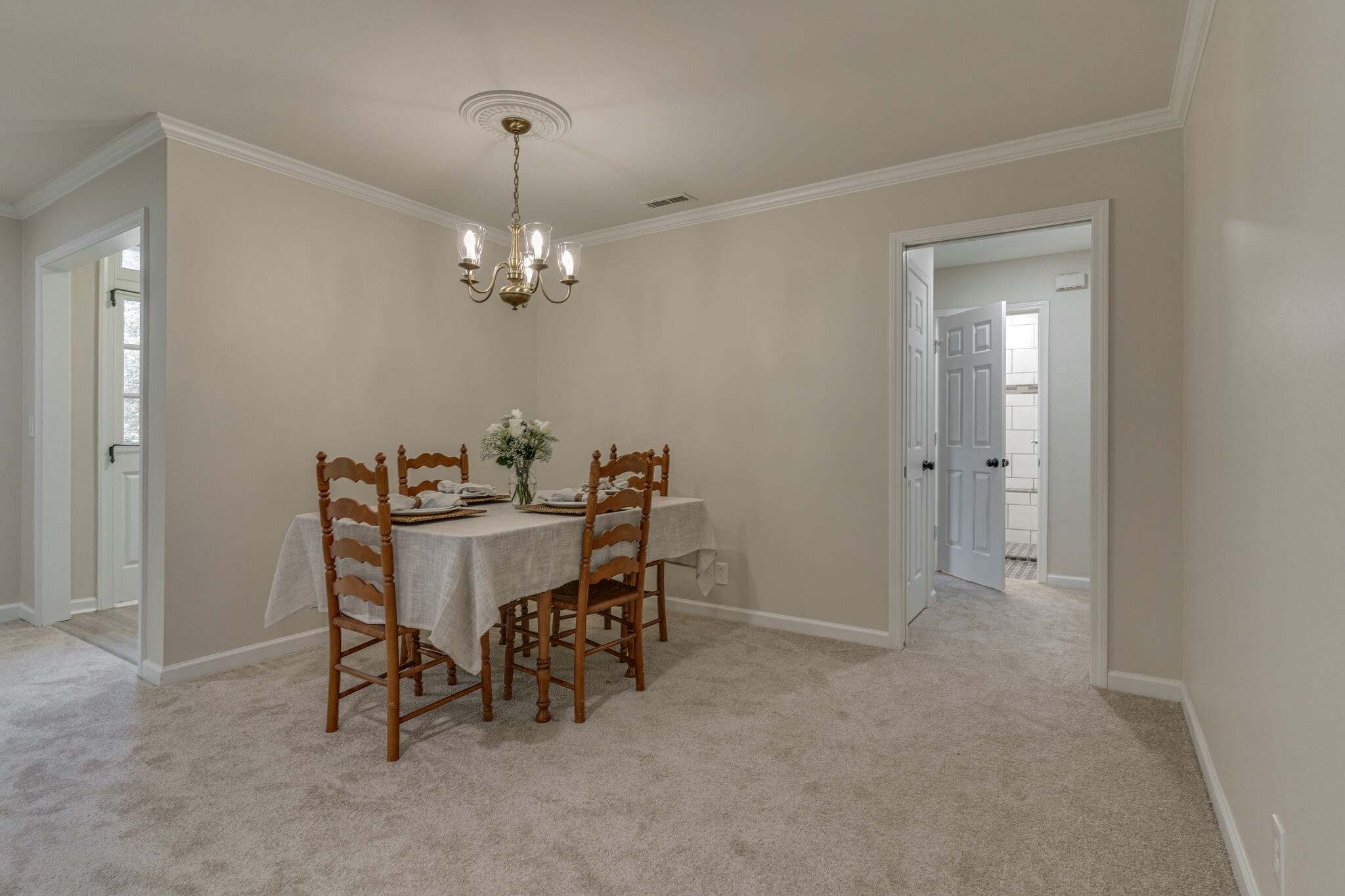 950 General George Patton Road Nashville, TN 37221 - Photo 11 of 34 a dining room with furniture and chandelier