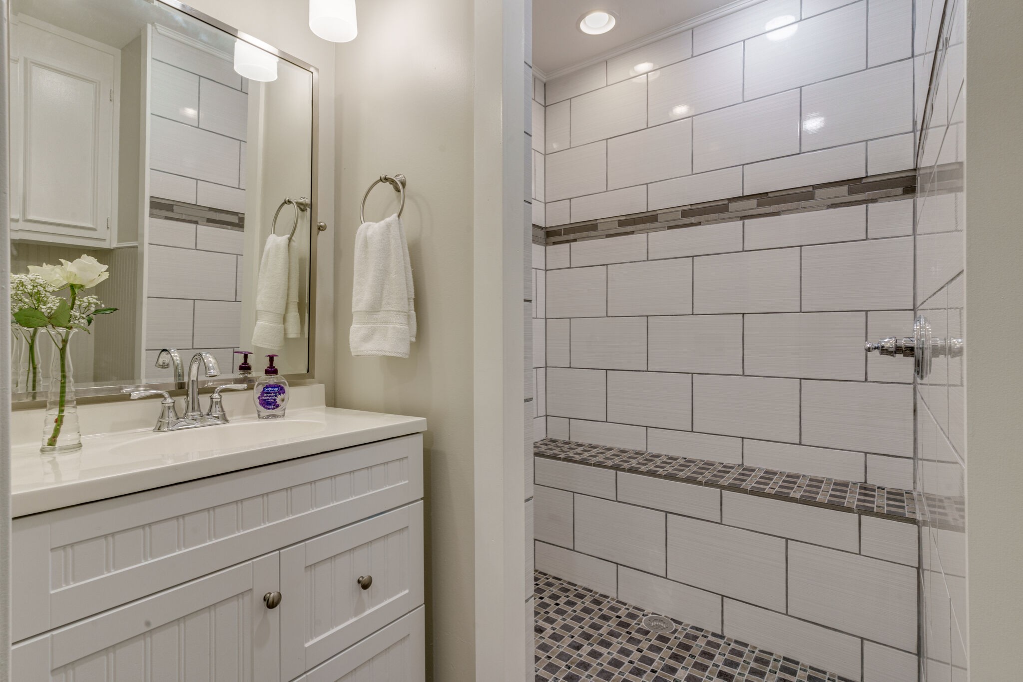 950 General George Patton Road Nashville, TN 37221 - Photo 13 of 34 a bathroom with a sink shower and a mirror