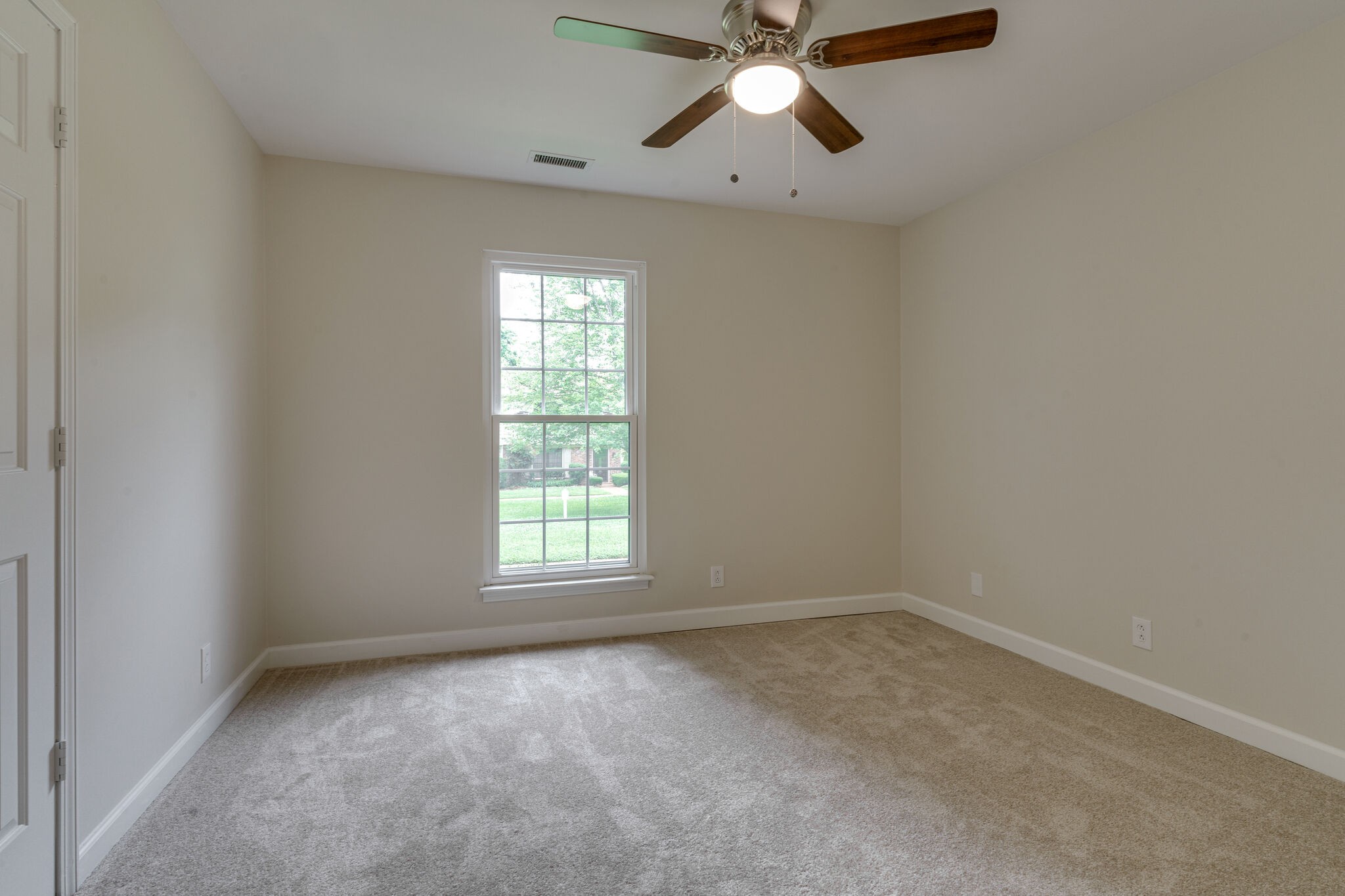 950 General George Patton Road Nashville, TN 37221 - Photo 15 of 34 an empty room with a window and a fan