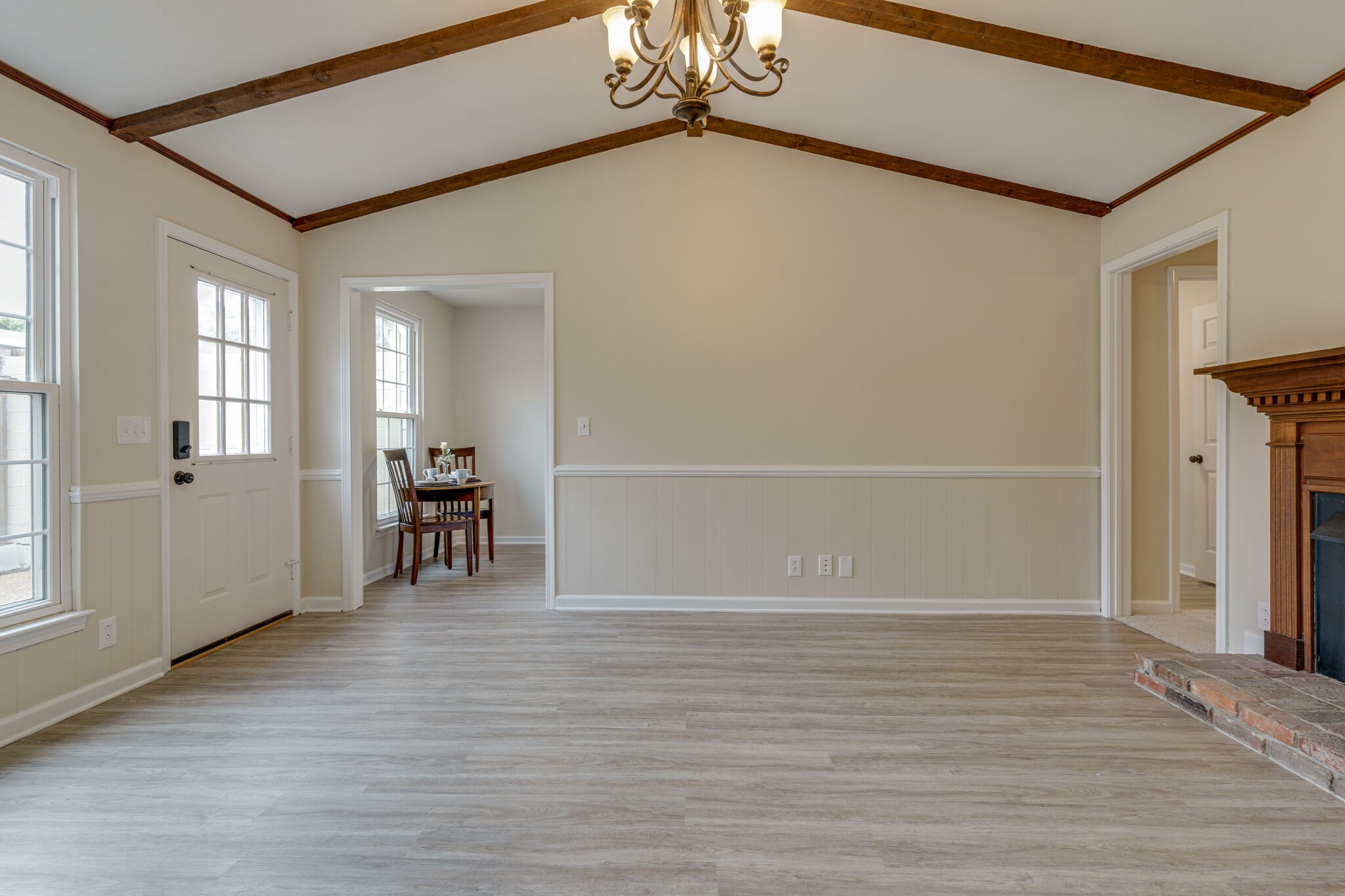 950 General George Patton Road Nashville, TN 37221 - Photo 25 of 34 a view of an empty room with wooden floor and a window