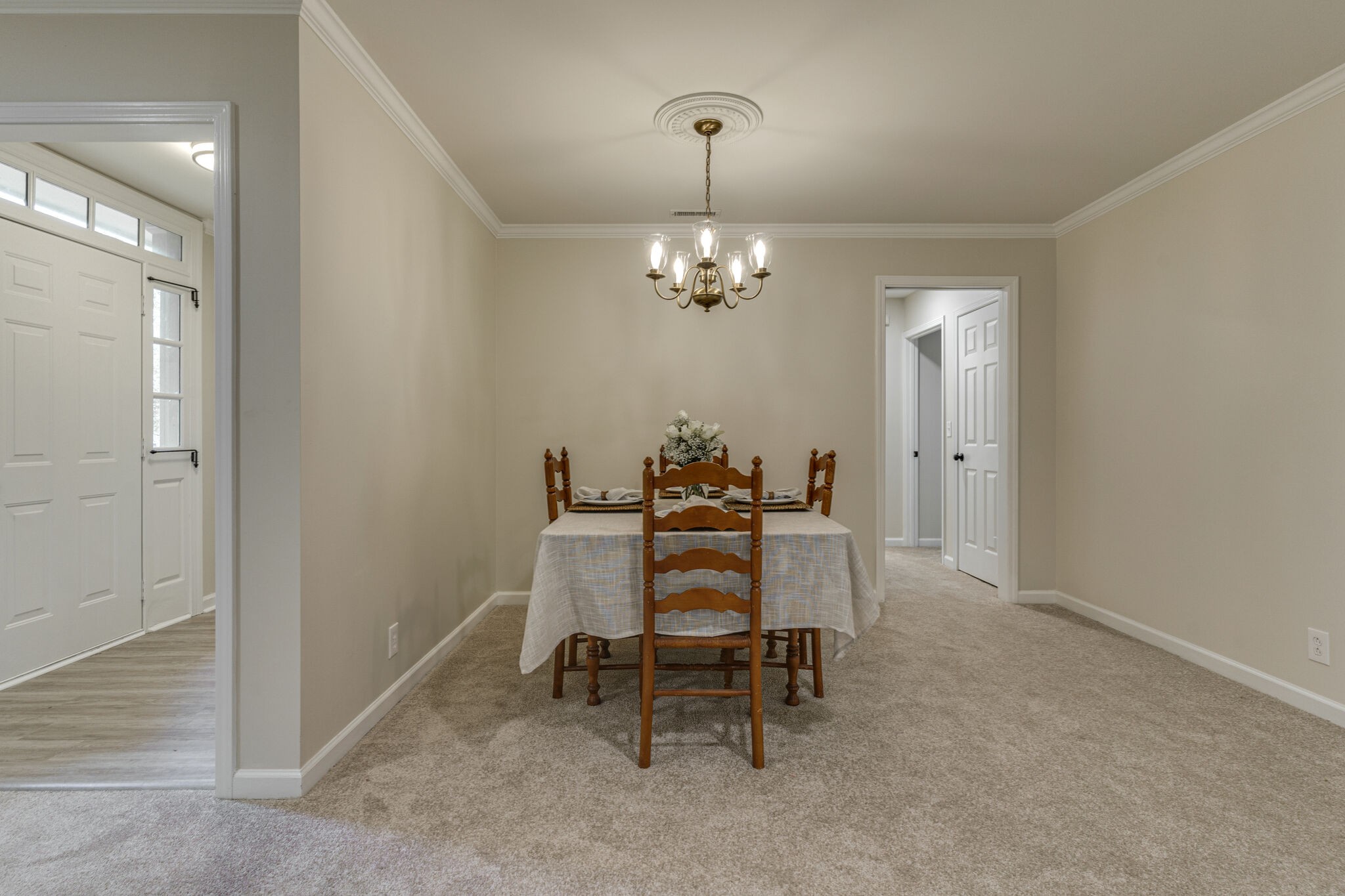 950 General George Patton Road Nashville, TN 37221 - Photo 10 of 34 a dining room with furniture and chandelier