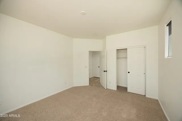 a bathroom with a bathtub shower sink vanity and toilet